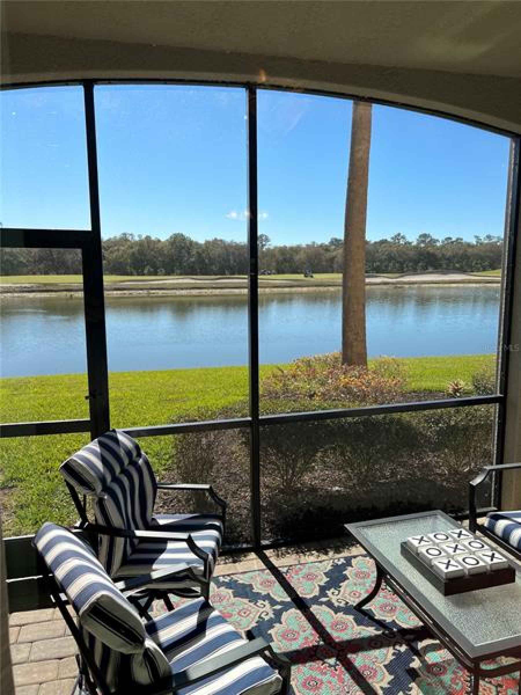 fabulous views of lake, golf course and trees and preserve