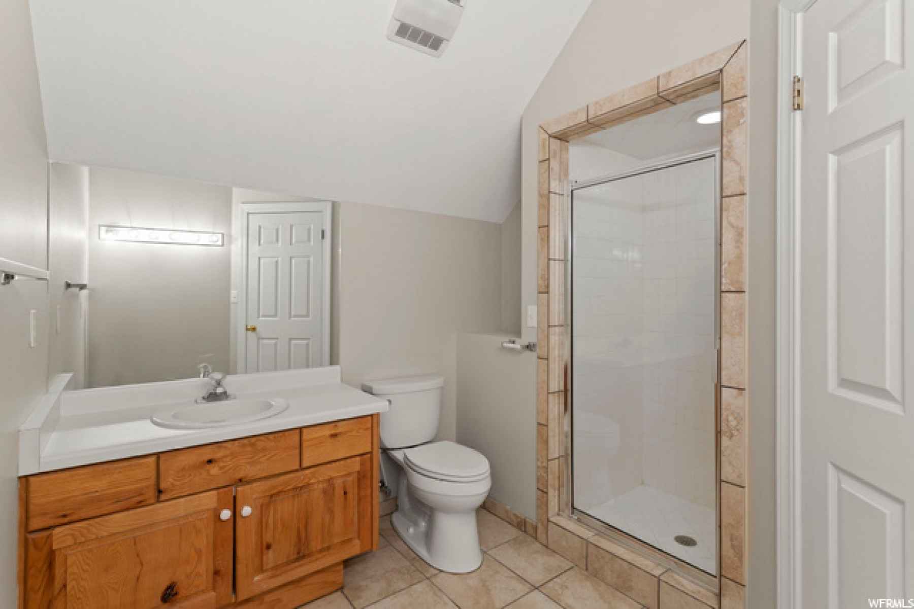 Great bathroom in bedroom 2 features sink, toilet, and shower!