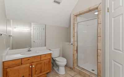 Great bathroom in bedroom 2 features sink, toilet, and shower!