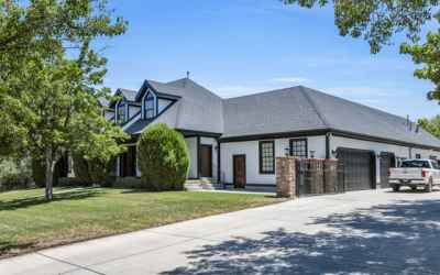 Gated drive with all the parking you will ever need! Huge oversized garage, plus 100X60 quonset!