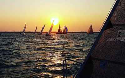 Sunset sailboat racing on Tampa Bay