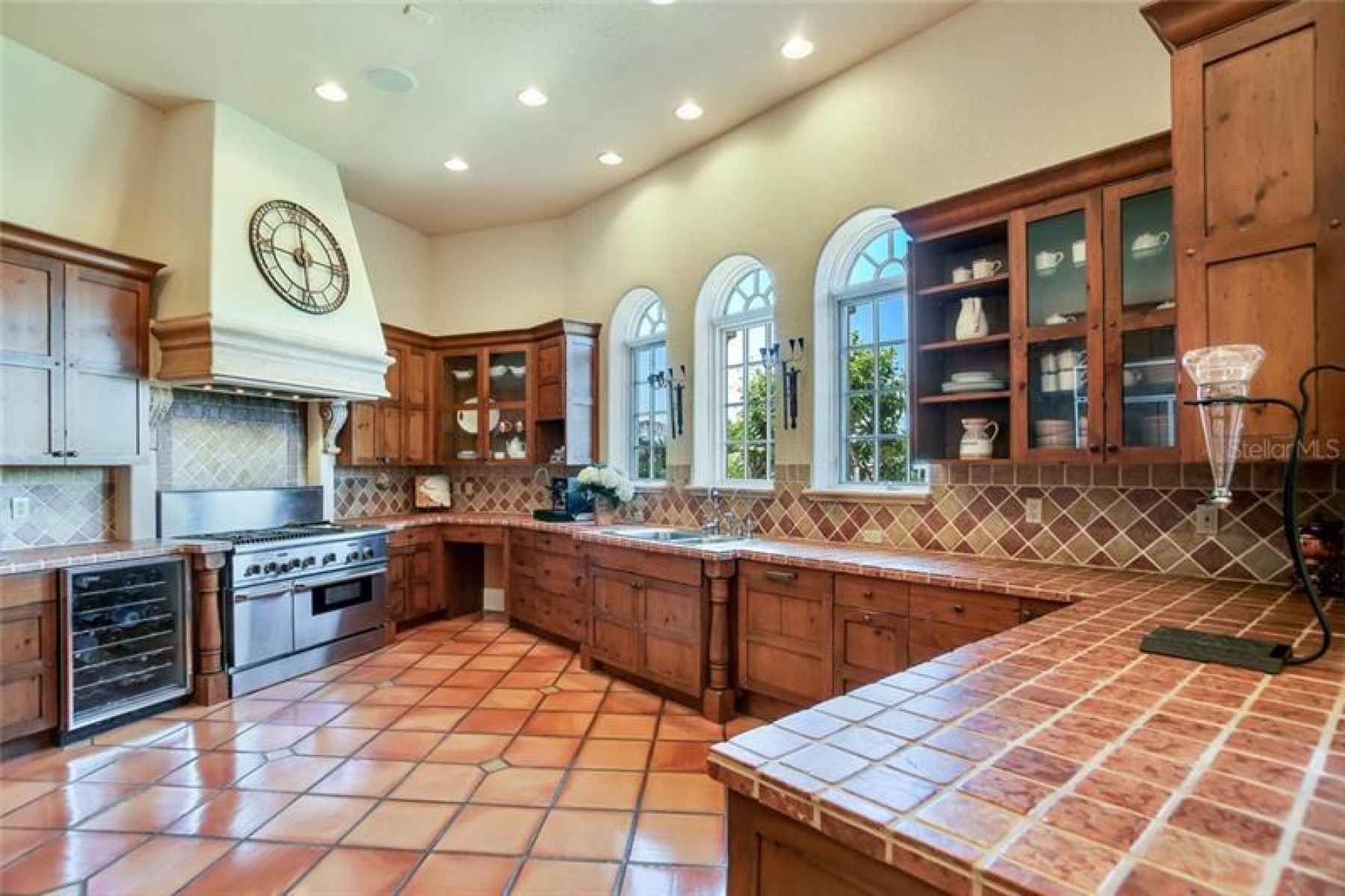 Kitchen with wine refrigerator and lots of display space
