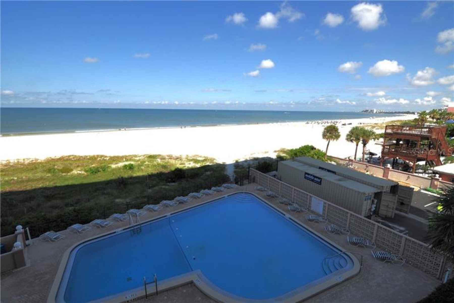 Relax by the beautiful salt water pool or on the expansive Beach on the Gulf