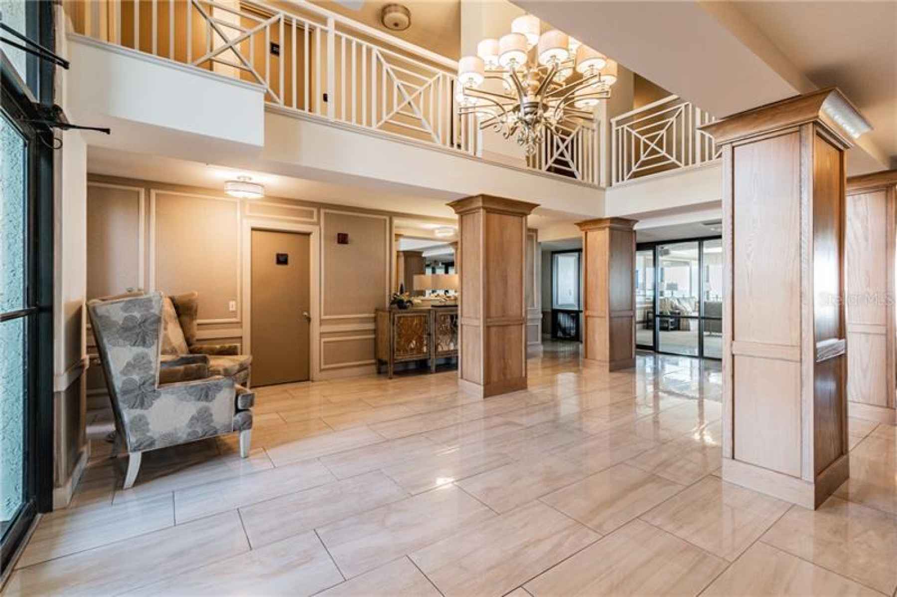 Entryway to elevators, amenities and outdoor pool area