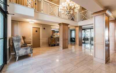 Entryway to elevators, amenities and outdoor pool area