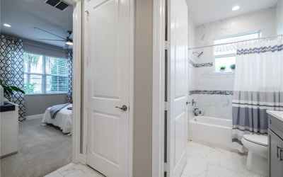 The Guest Bathroom features a bath/shower with floor to ceiling tile with a double Listello, and an 