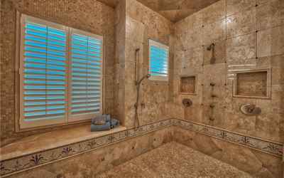 Walk-In Shower with Tile Detailing, Bench and Multiple Shower Heads