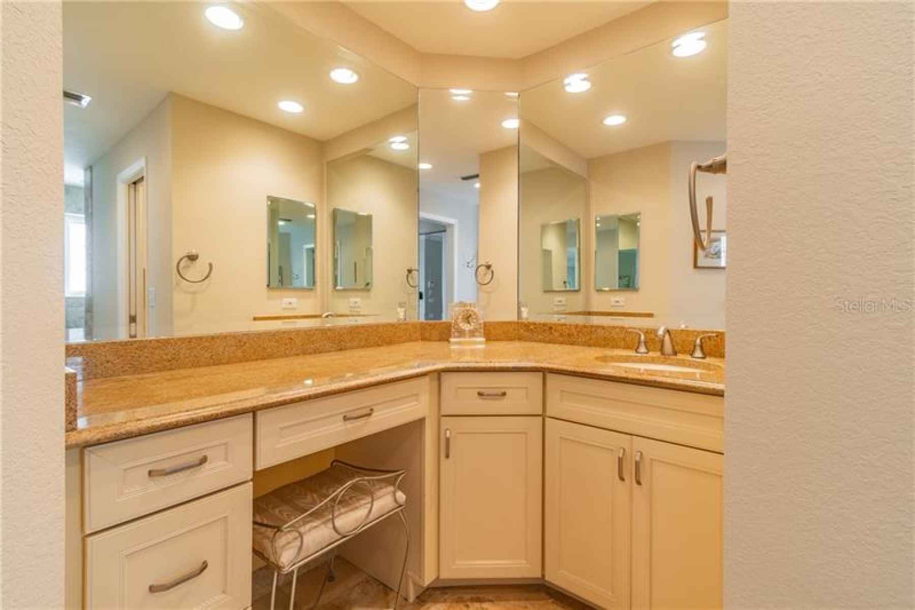 Master bath with granite counters, walk-in shower, water closet and 2 walk-in closets.