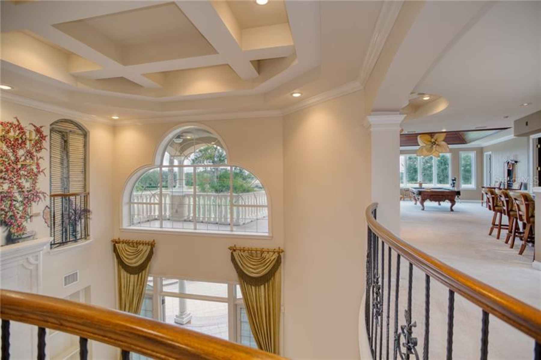 Ceiling detail overlooking balcony and game room