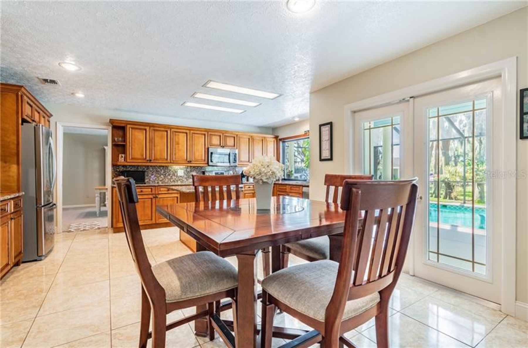 Eat-in kitchen dining space with French doors to patio.