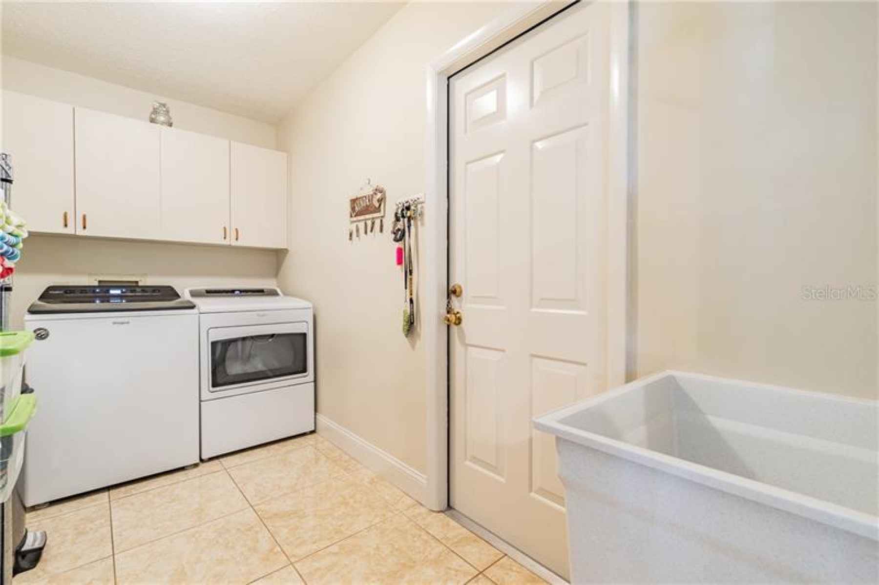 Laundry room and garage access.
