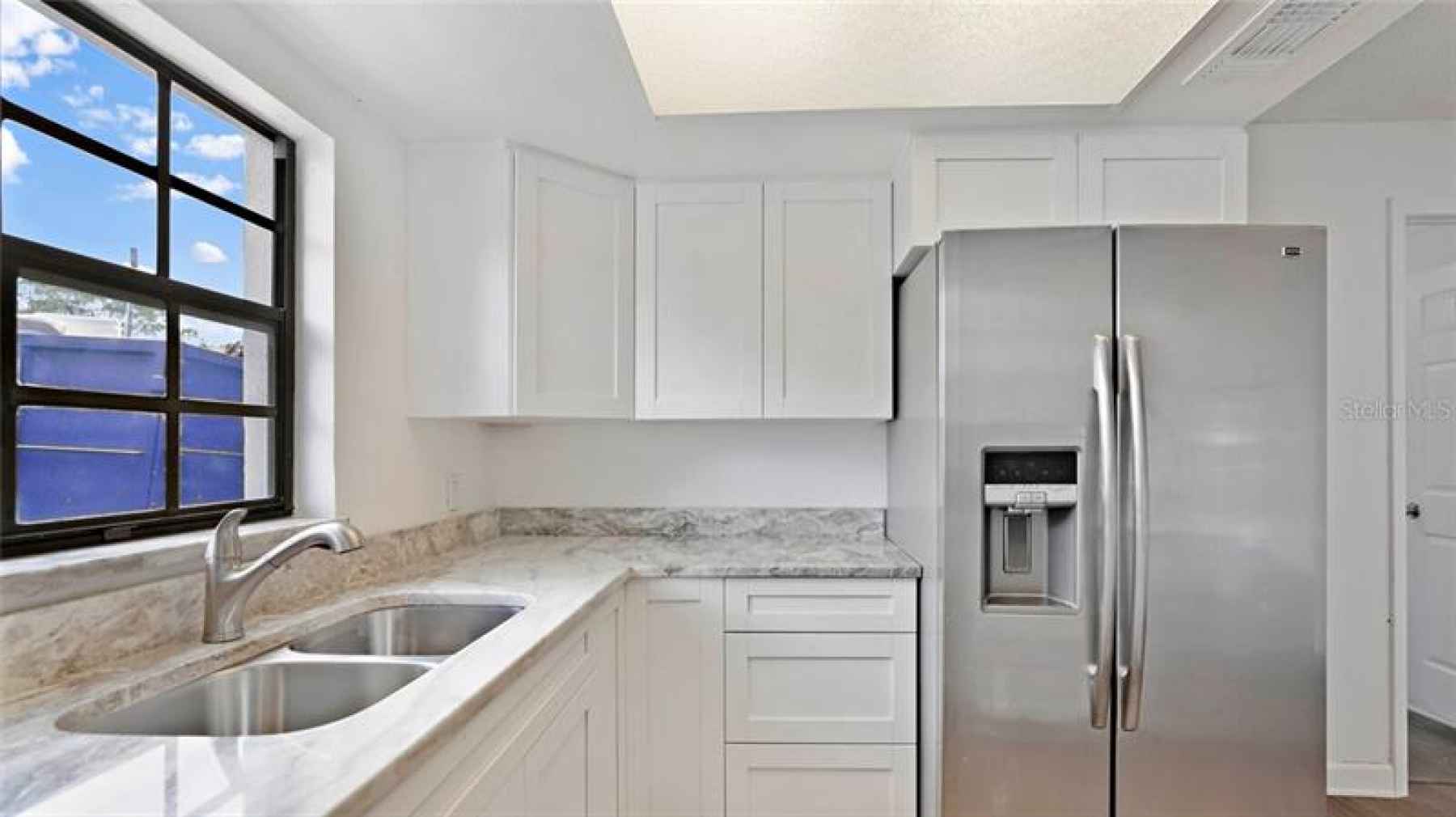 Beautifully updated kitchen with granite counters.