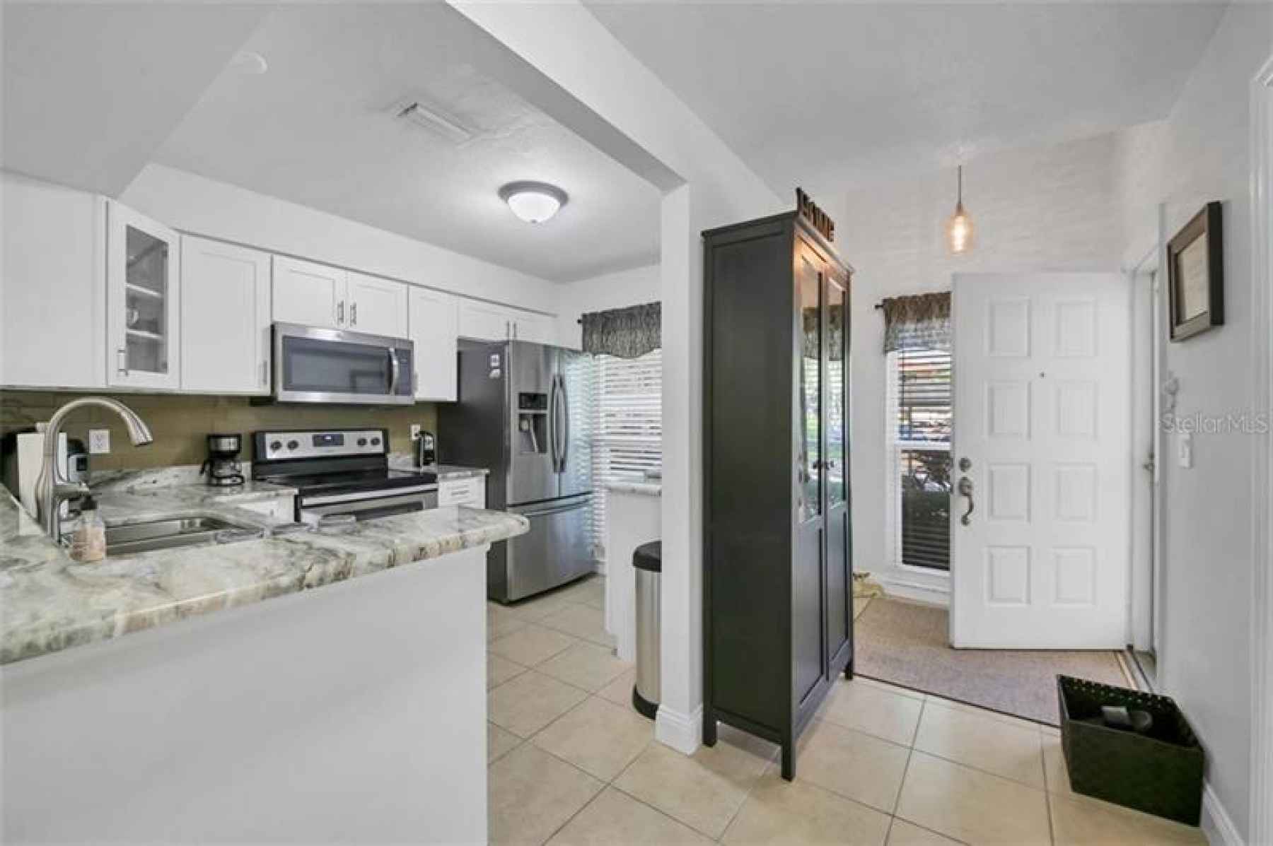 Clean, fully remodeled kitchen and those amazing counters!!!!