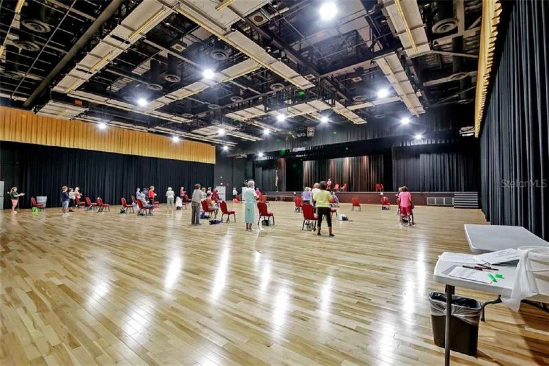Exercise class going on in the large auditorium