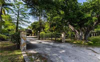 Entire 1.26 acres fenced in with Gorgeous road frontage