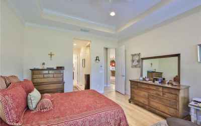 Master bedroom is spacious, relaxing and contemporary.