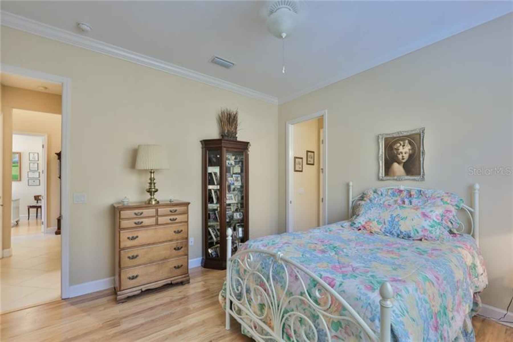 Lovely second bedroom is relaxing and spacious.