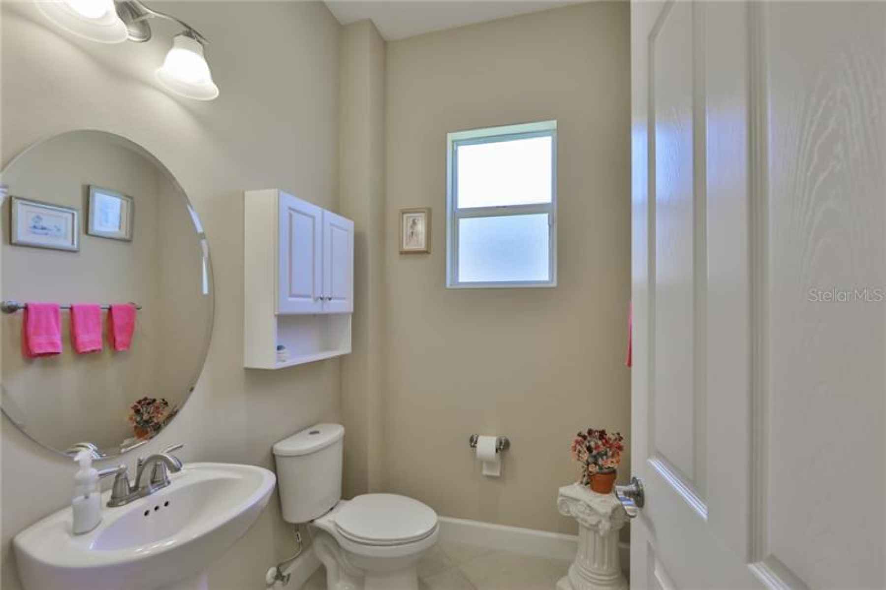 The half bath is perfect for visiting guests.