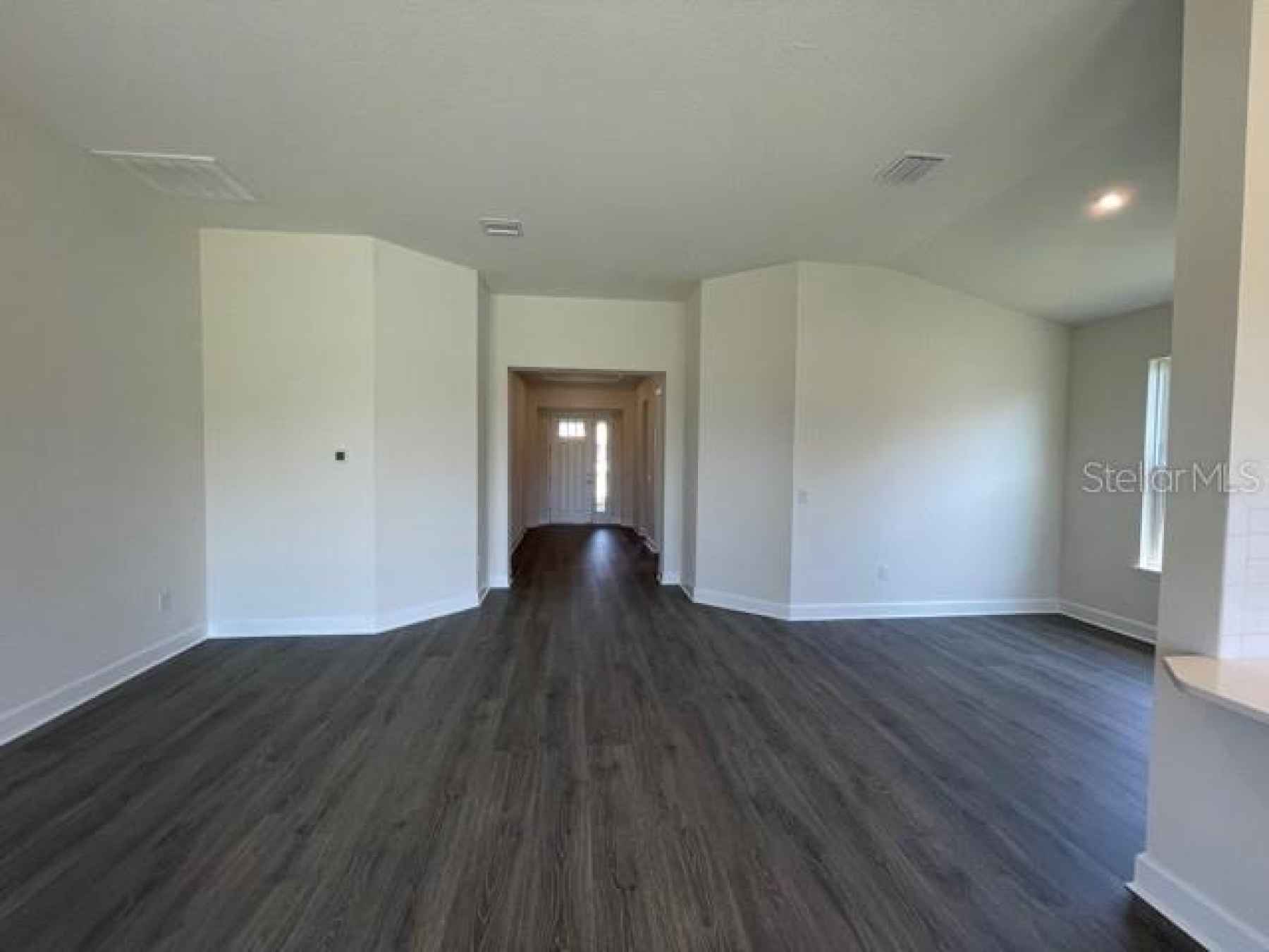 Beautiful views from family room to the inviting entry!