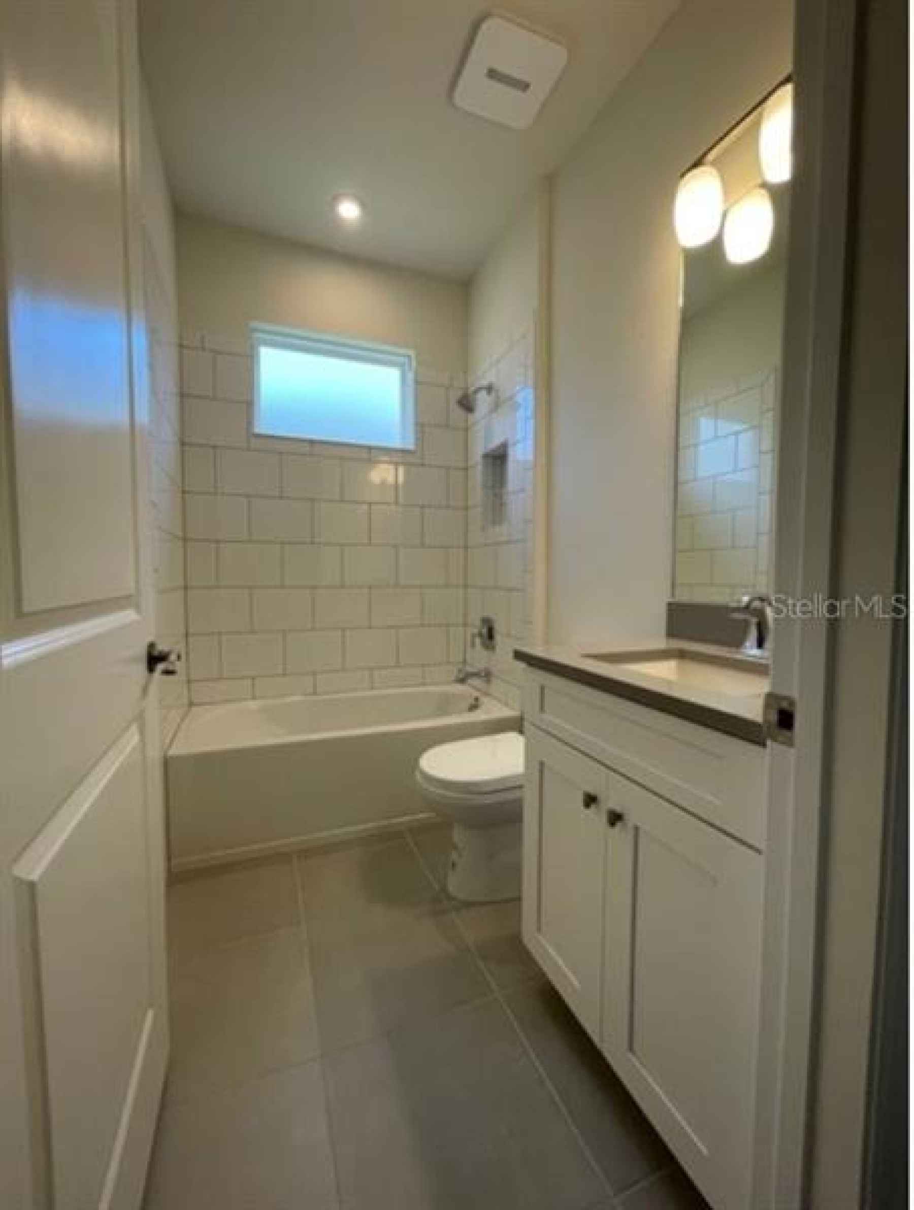 This stylish bathroom is perfect for guests and will be perfect for getting ready in the mornings!