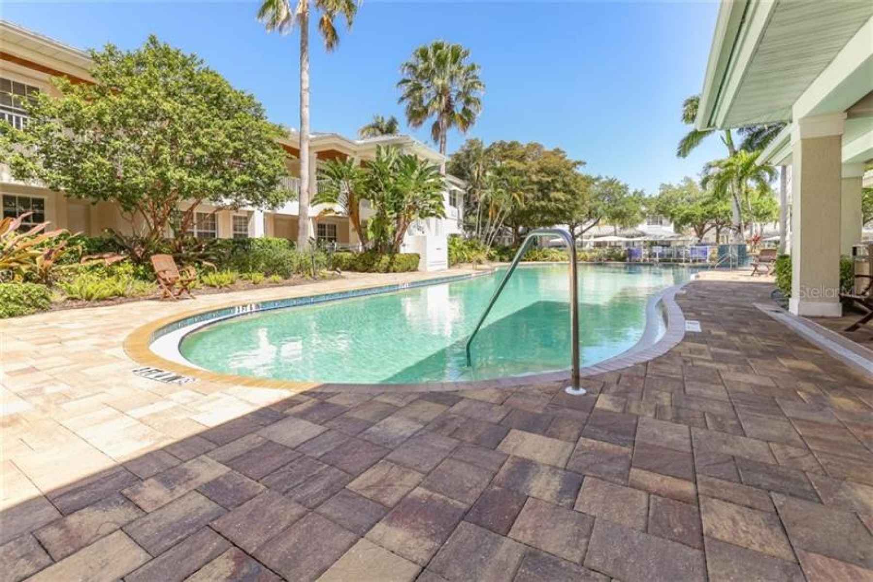 Beautiful pool and spa connected to private clubhouse