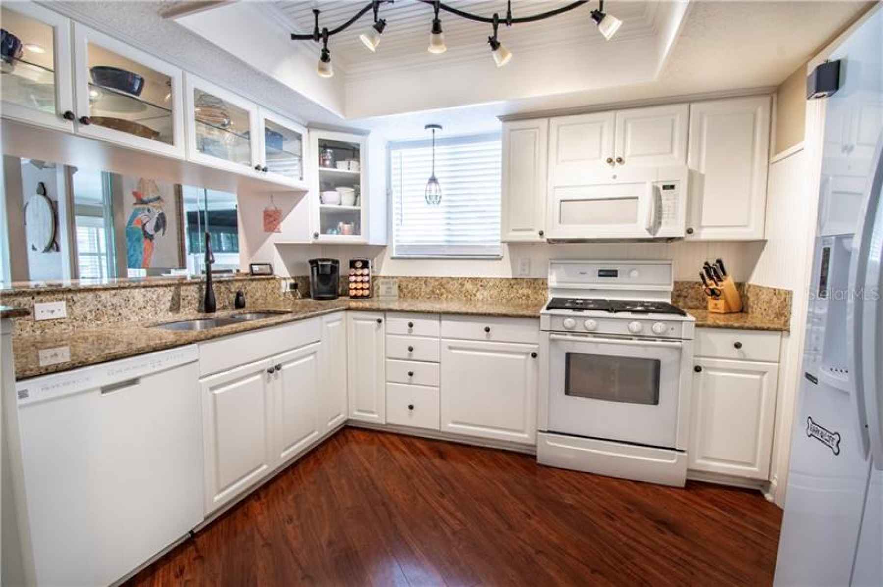 Kitchen with top end appliances and granite countertops