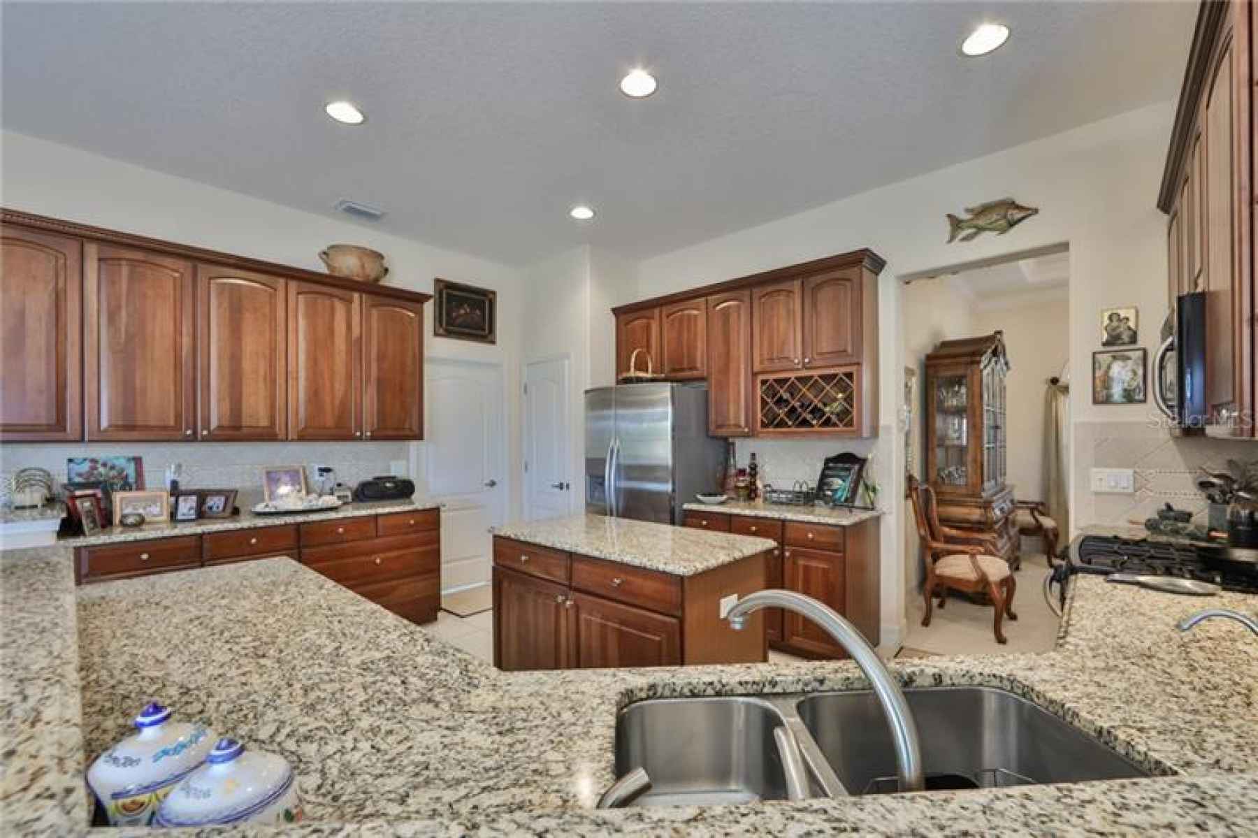 There is never too much counter space!  The laundry room is to the back left and the dining room is 
