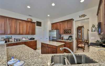 There is never too much counter space!  The laundry room is to the back left and the dining room is 