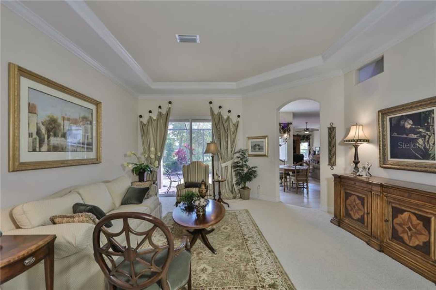 The tray ceiling, crown molding and subtle nuances of high end details, such as the rounded corners 