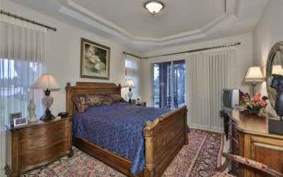The Master bedroom is spacious and dipped in 'comfort', with a tray ceiling, large windows, large sl
