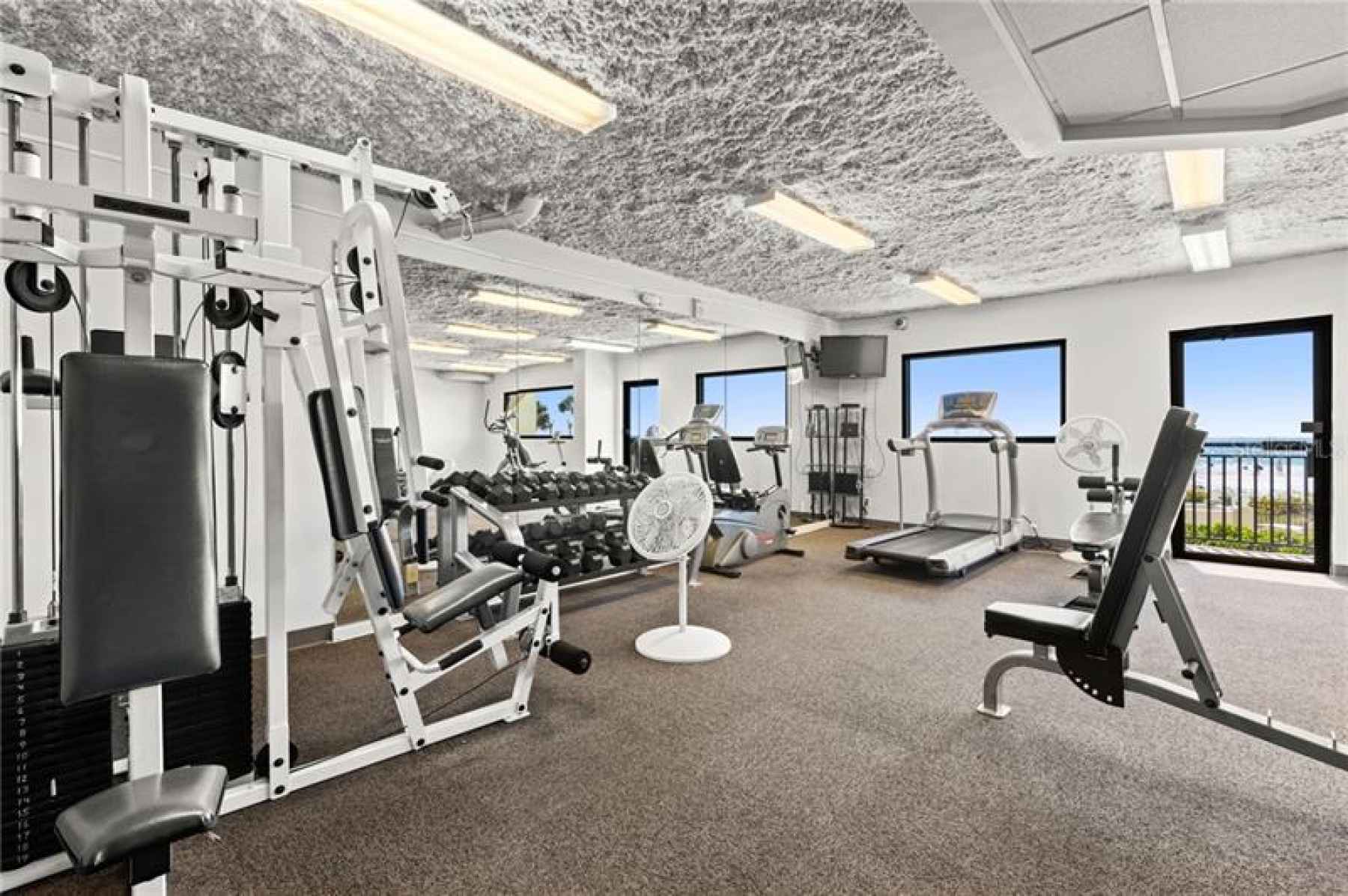 Fitness room with beach views.