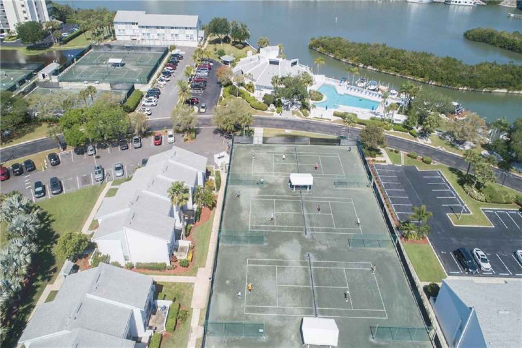 Tennis courts, clubhouse and pool
