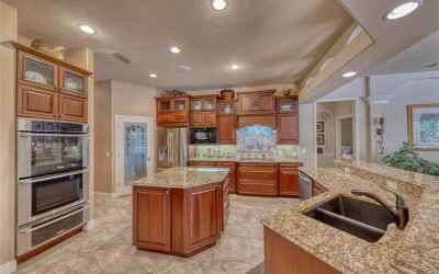Kitchen... notice walk in pantry, double oven, warming drawer and ample storage space