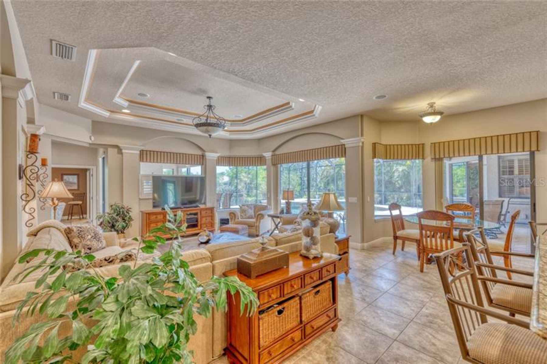 Large, open concept Family Room, Kitchen, Breakfast nook... all leading out to the pool/lanai with s