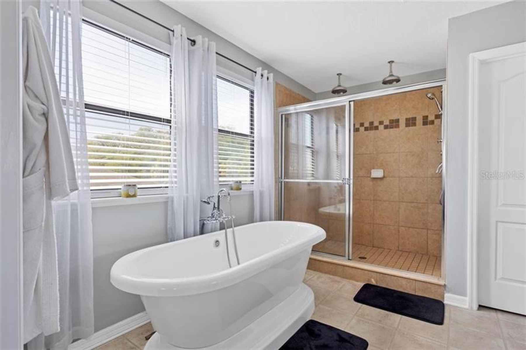 Master bath with free-standing tub & shower.