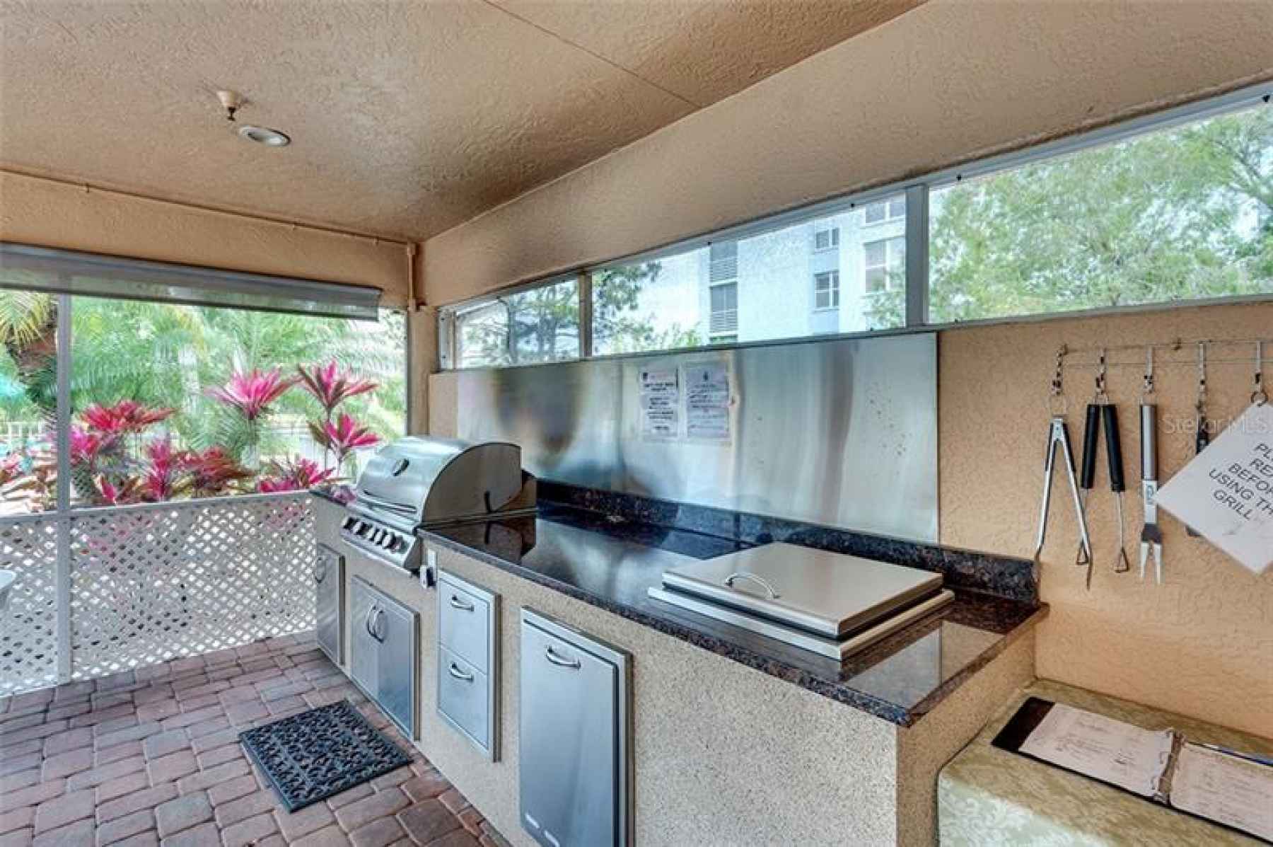 Wow look at this outdoor kitchen available for all the residents.