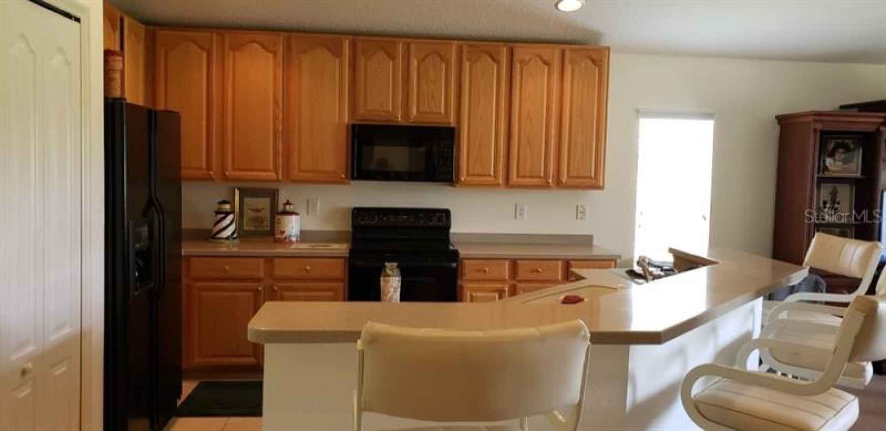 Open Kitchen with solid Corian counter tops