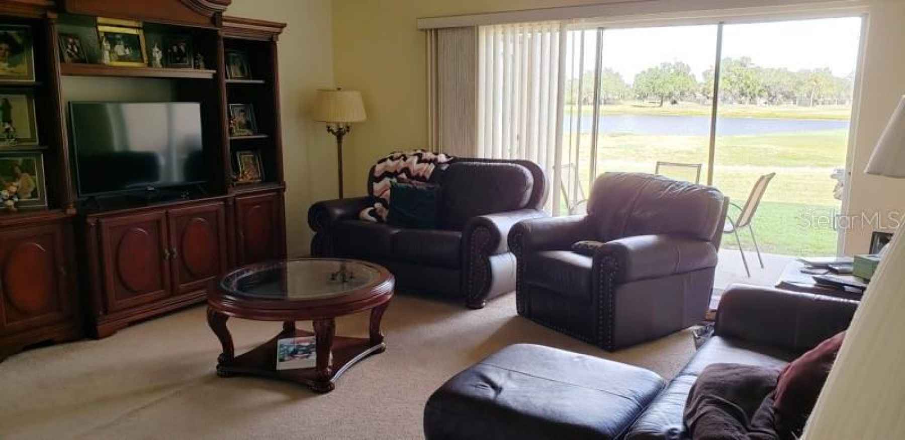 Family room looking out to 16th hole of golf coarse and water view