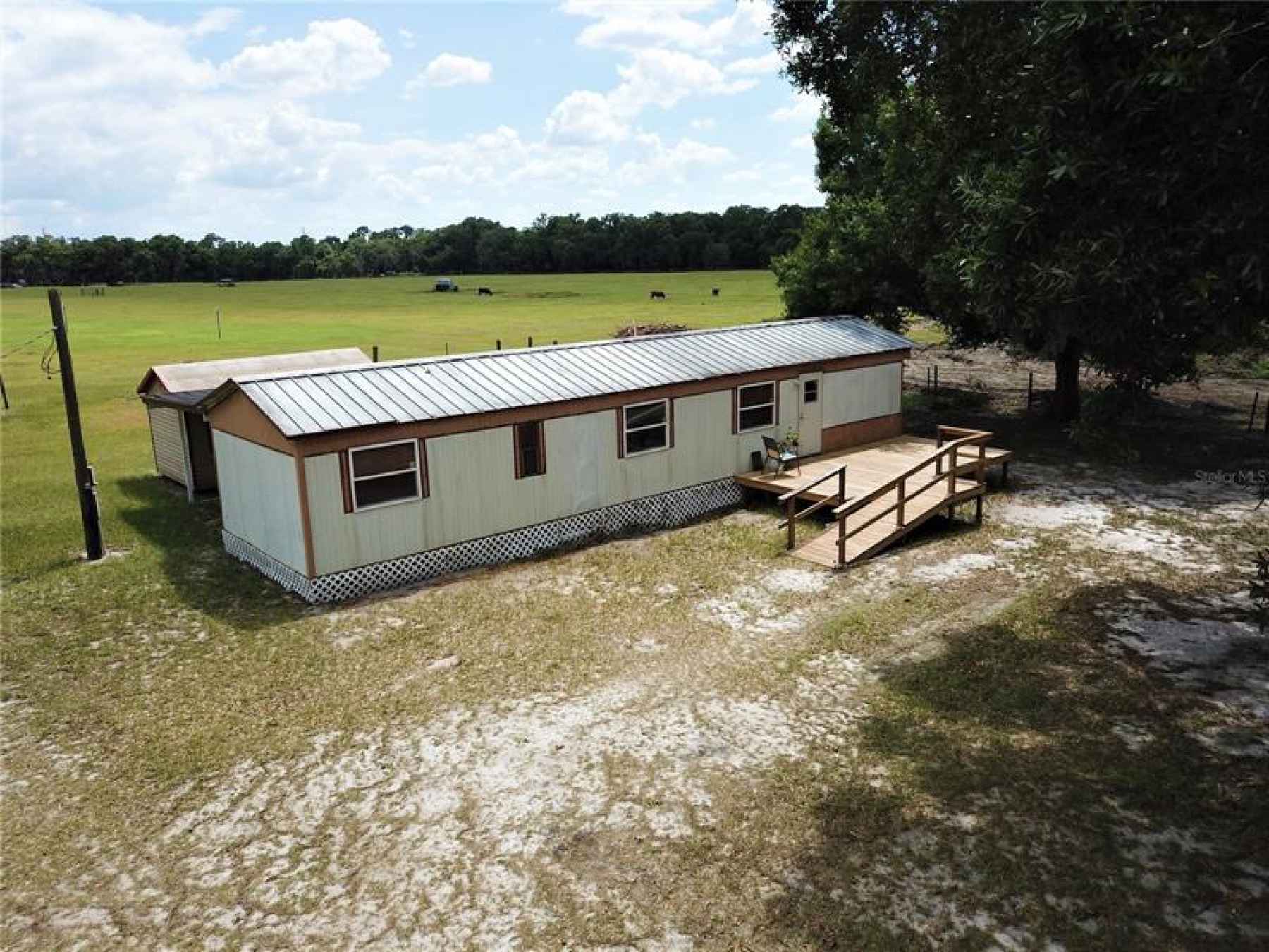17115 Katie Stanaland single wide with 728 Square Feet of Living area and 5 Acres