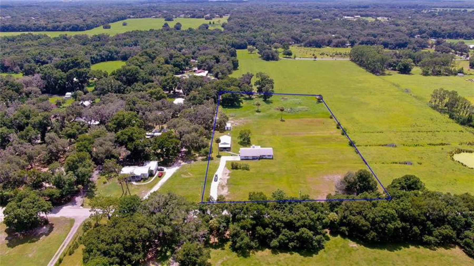 Five acres of pure bliss complete with TWO HOMES on the property!