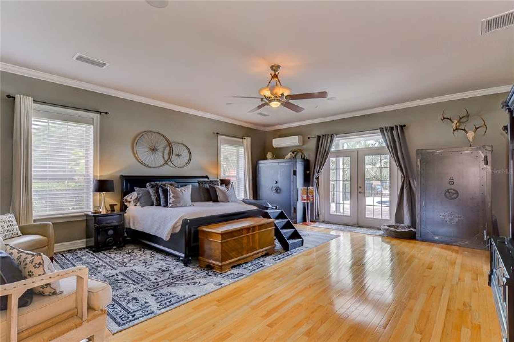 The breathtaking master suite is secluded on the first floor with impeccable views!