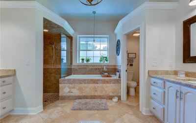 a beautiful en-suite offering luxury separate vanities!