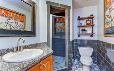 Step into this marvelous bathroom with a walk in shower!