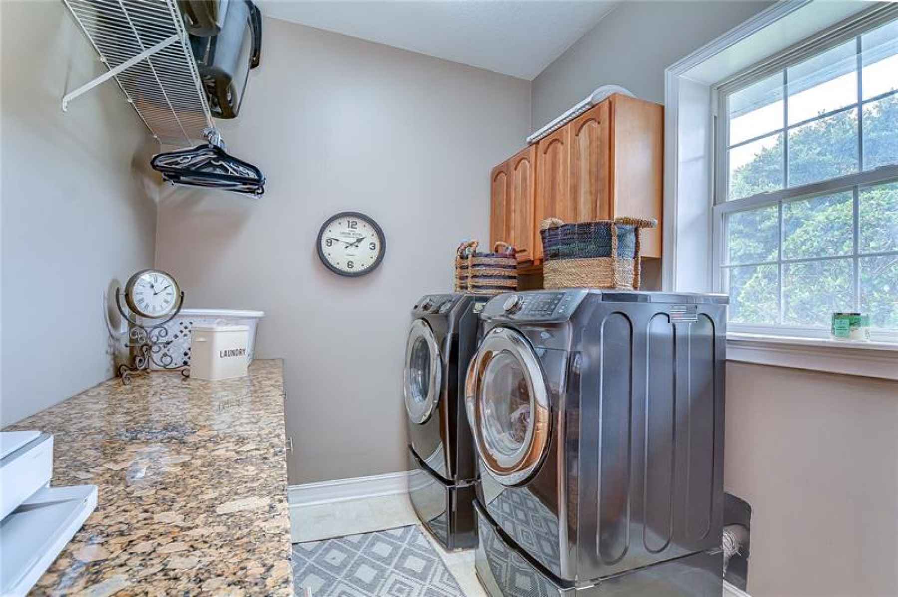 This laundry room features plenty of countertop space!
