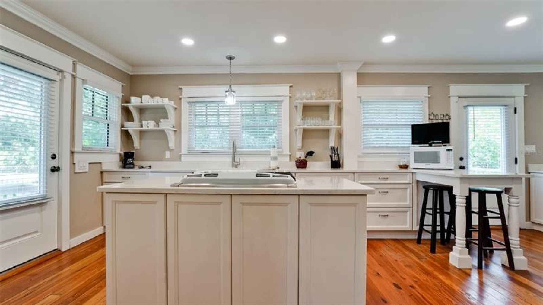 Ahh! Modern kitchen of your dreams in historic envelope. Cambria quartz counters and 5 burner gas st