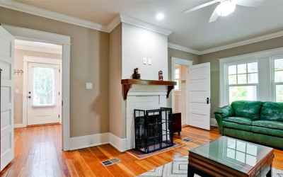 Bedroom 4 located on first floor offers fireside and private bath. Doors to both carport entry and k