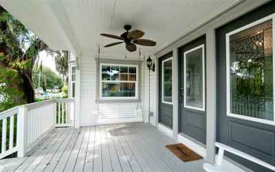 6th Ave front porch.  Swing even features cup holders in the arm rests.