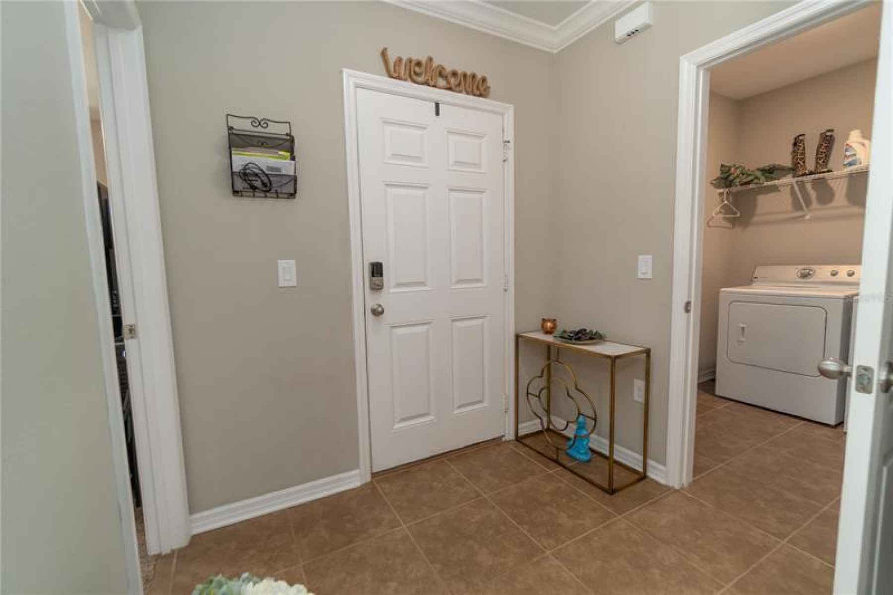 Entrance Door with Laundry Room on the Right.