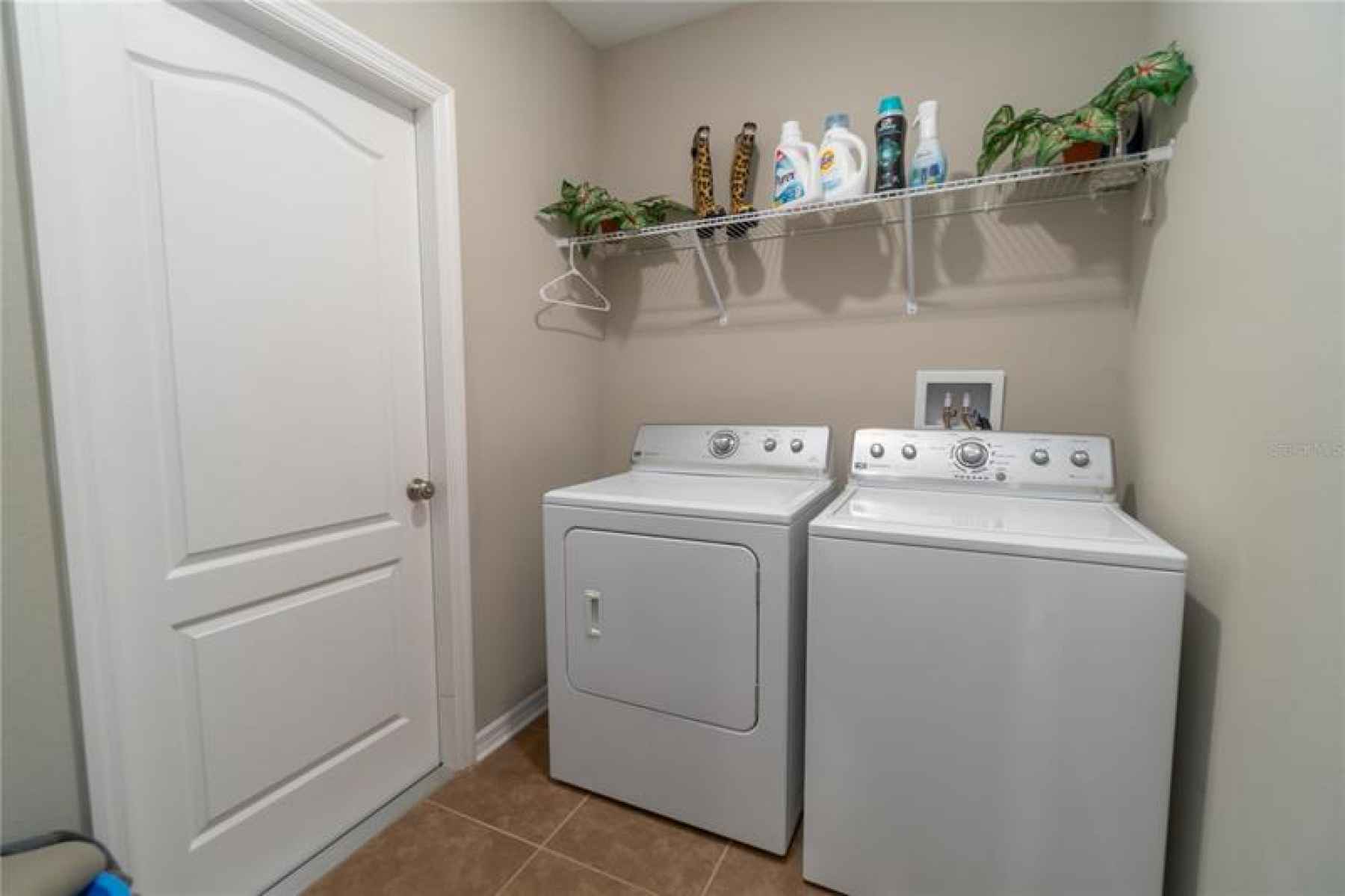 Laundry Room with Entrance from the two Car Garage