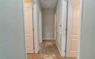 Hallway to Bedrooms and Second Bathroom